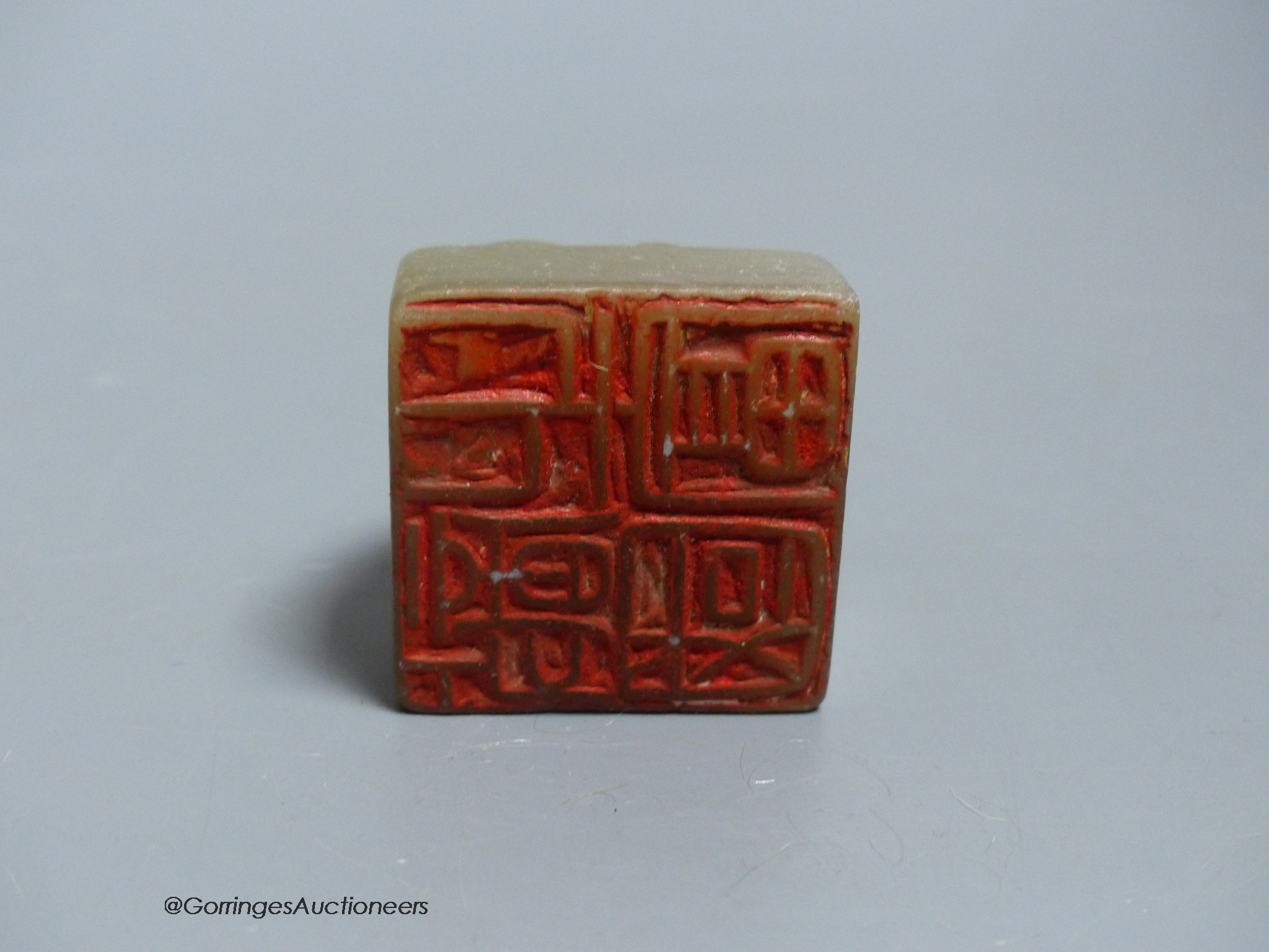 A Chinese carved soapstone 'lion-dog' seal, height 3.5cm